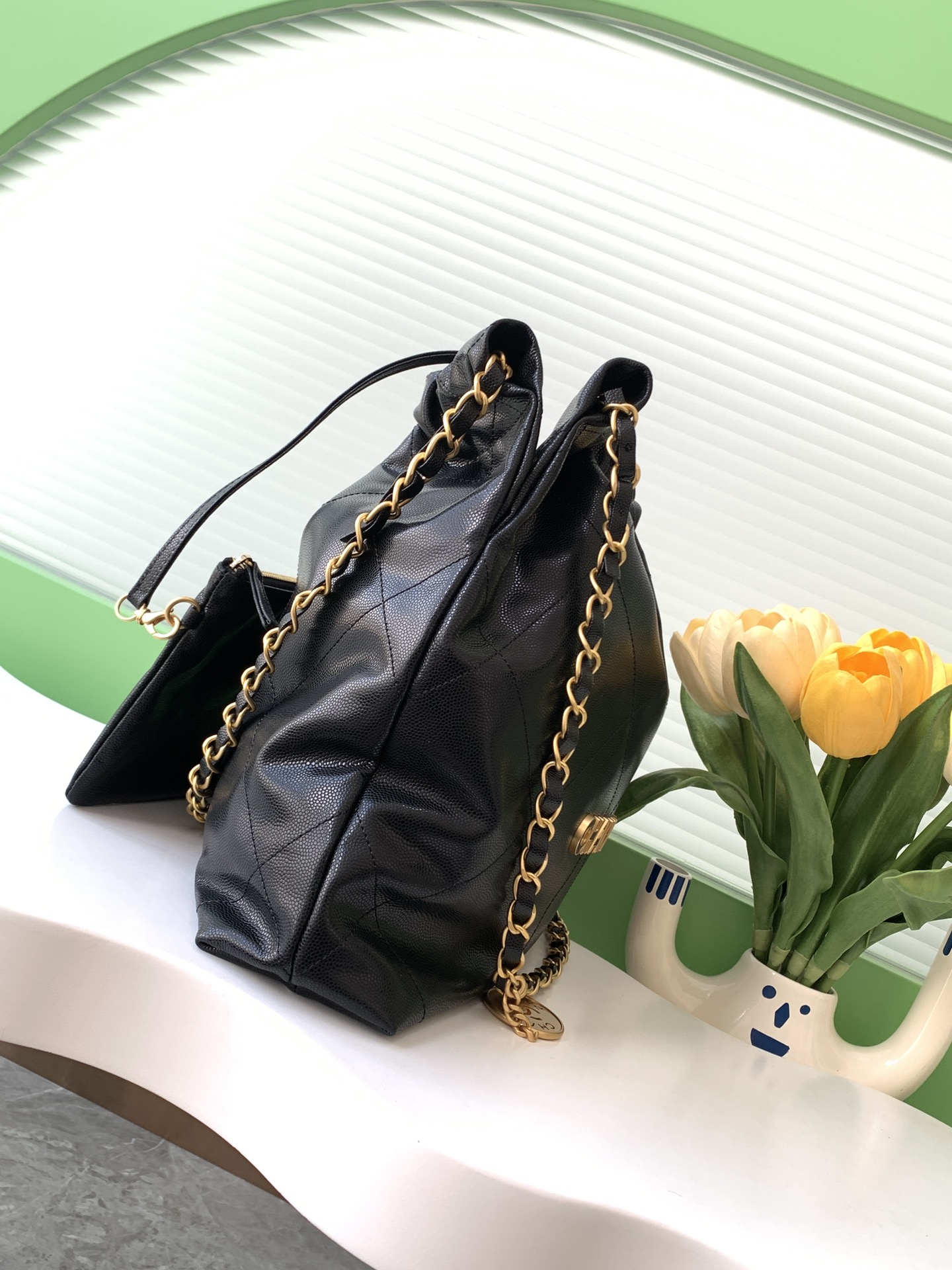 Chanel Shiny Calfskin Quilted Small Chanel 22 Black 24K ball patterned shopping bag Chanel Shiny Calfskin Quilted Small Chanel 22 Black 24K ball patterned shopping bag