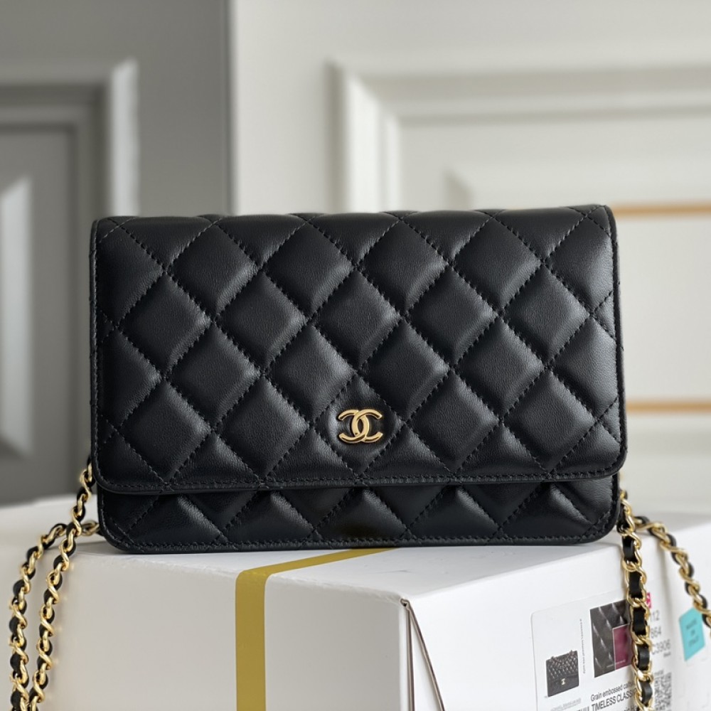 Chanel Wallet on Chain (WOC) shoulder bag in Black quilted Caviar leather
