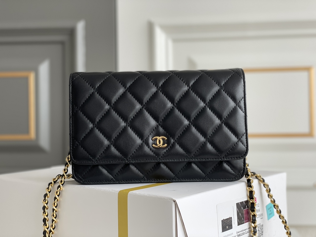 Chanel Wallet on Chain (WOC) shoulder bag in Black quilted Caviar leather Chanel Wallet on Chain (WOC) shoulder bag in Black quilted Caviar leather