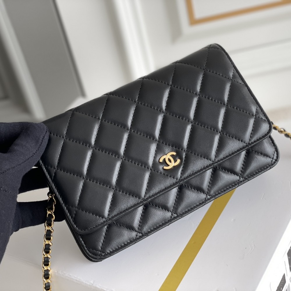 Chanel Wallet on Chain (WOC) shoulder bag in Black quilted Caviar leather