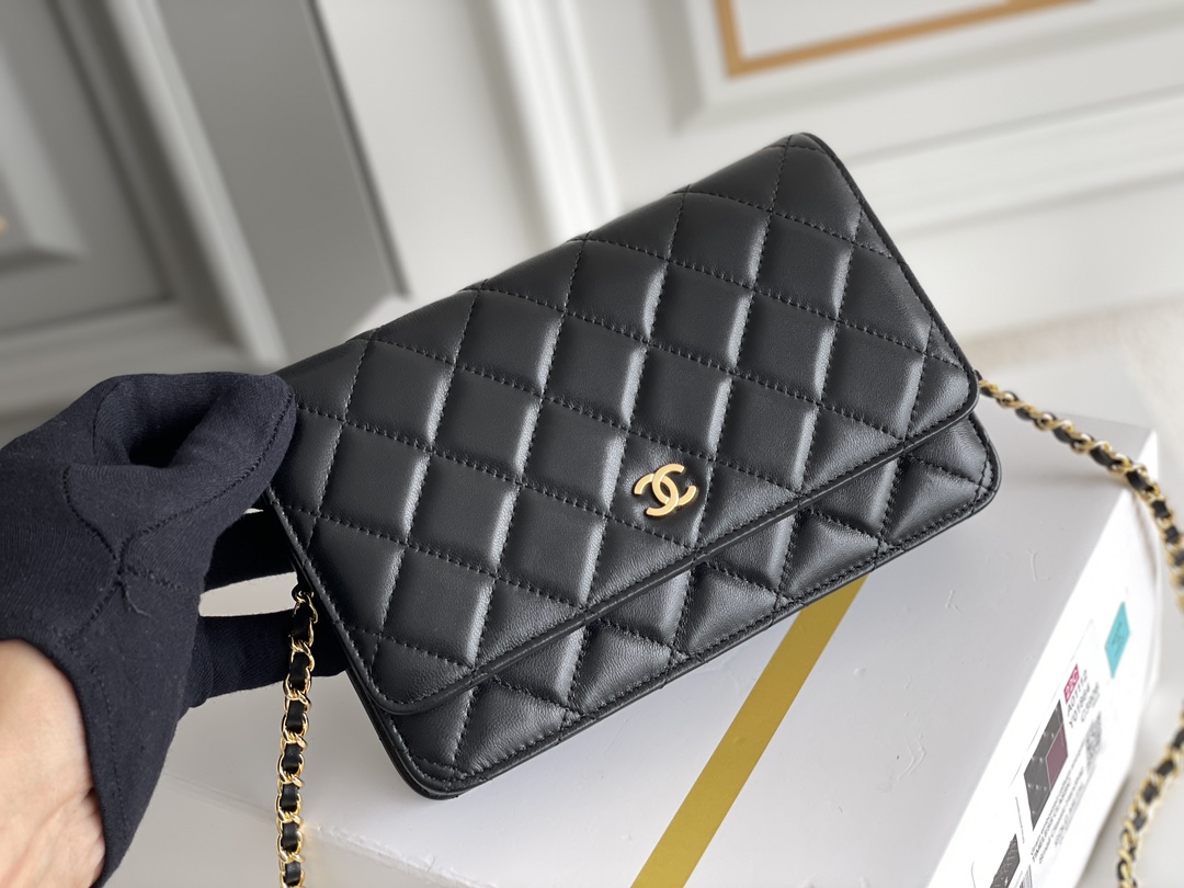 Chanel Wallet on Chain (WOC) shoulder bag in Black quilted Caviar leather Chanel Wallet on Chain (WOC) shoulder bag in Black quilted Caviar leather