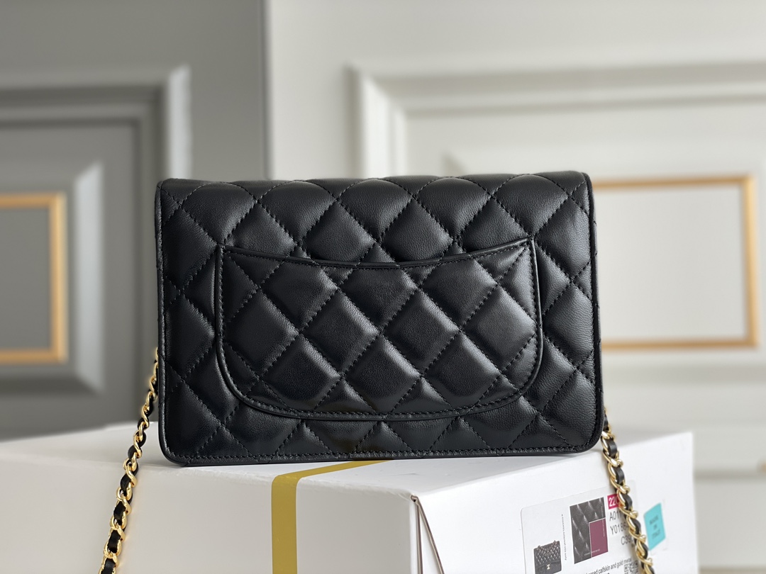 Chanel Wallet on Chain (WOC) shoulder bag in Black quilted Caviar leather Chanel Wallet on Chain (WOC) shoulder bag in Black quilted Caviar leather