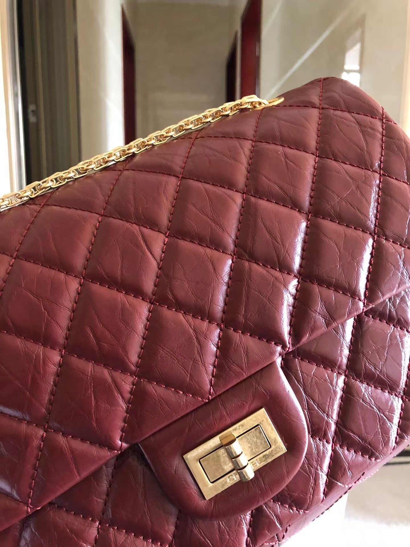 Chanel 2.55 Medium Reissue in burgundy