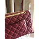 Chanel 2.55 Medium Reissue in burgundy