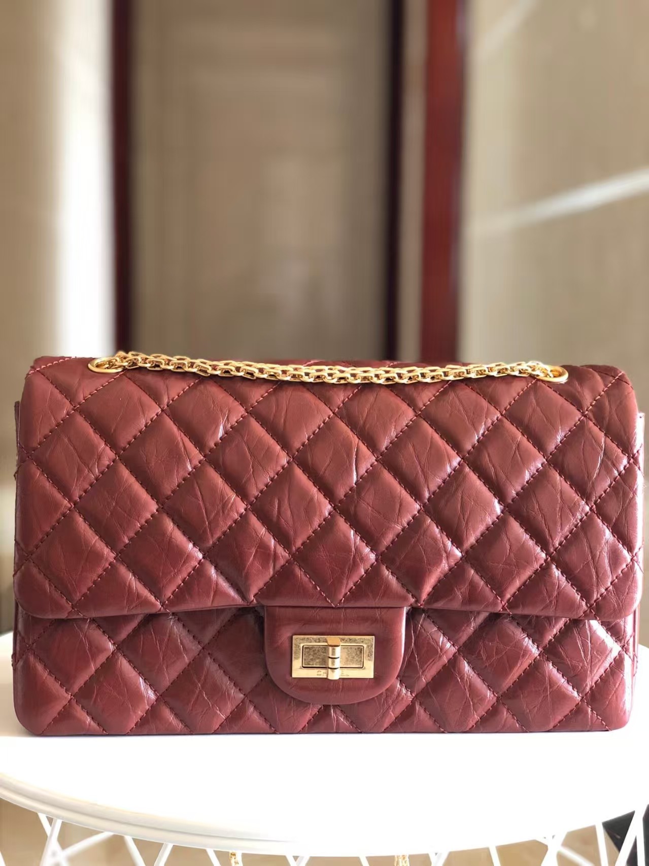 Chanel 2.55 Medium Reissue in burgundy