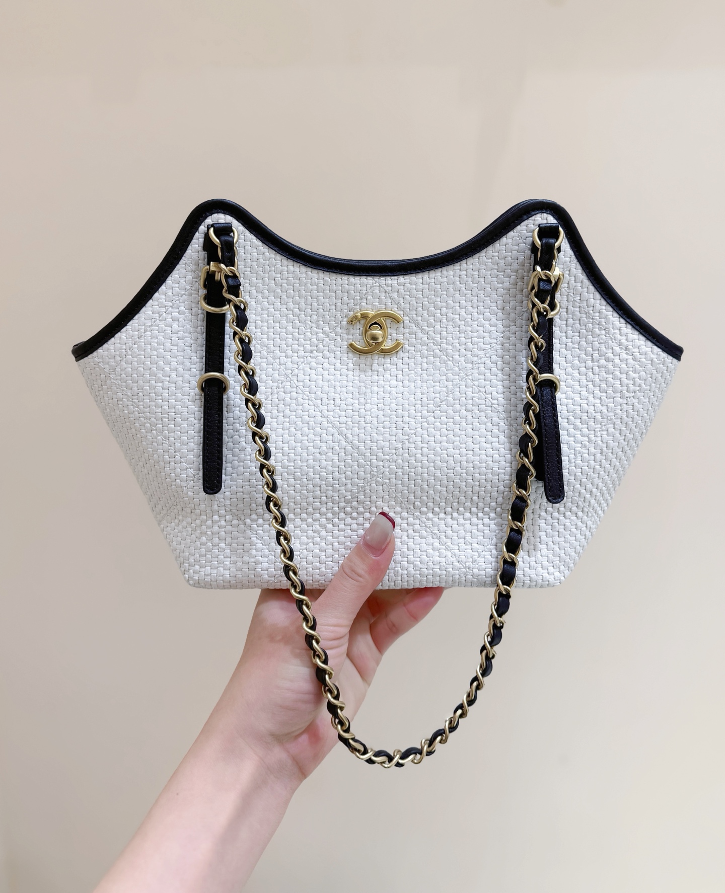 Chanel Maxi shopping bag, Braided raffia, calfskin & gold-tone