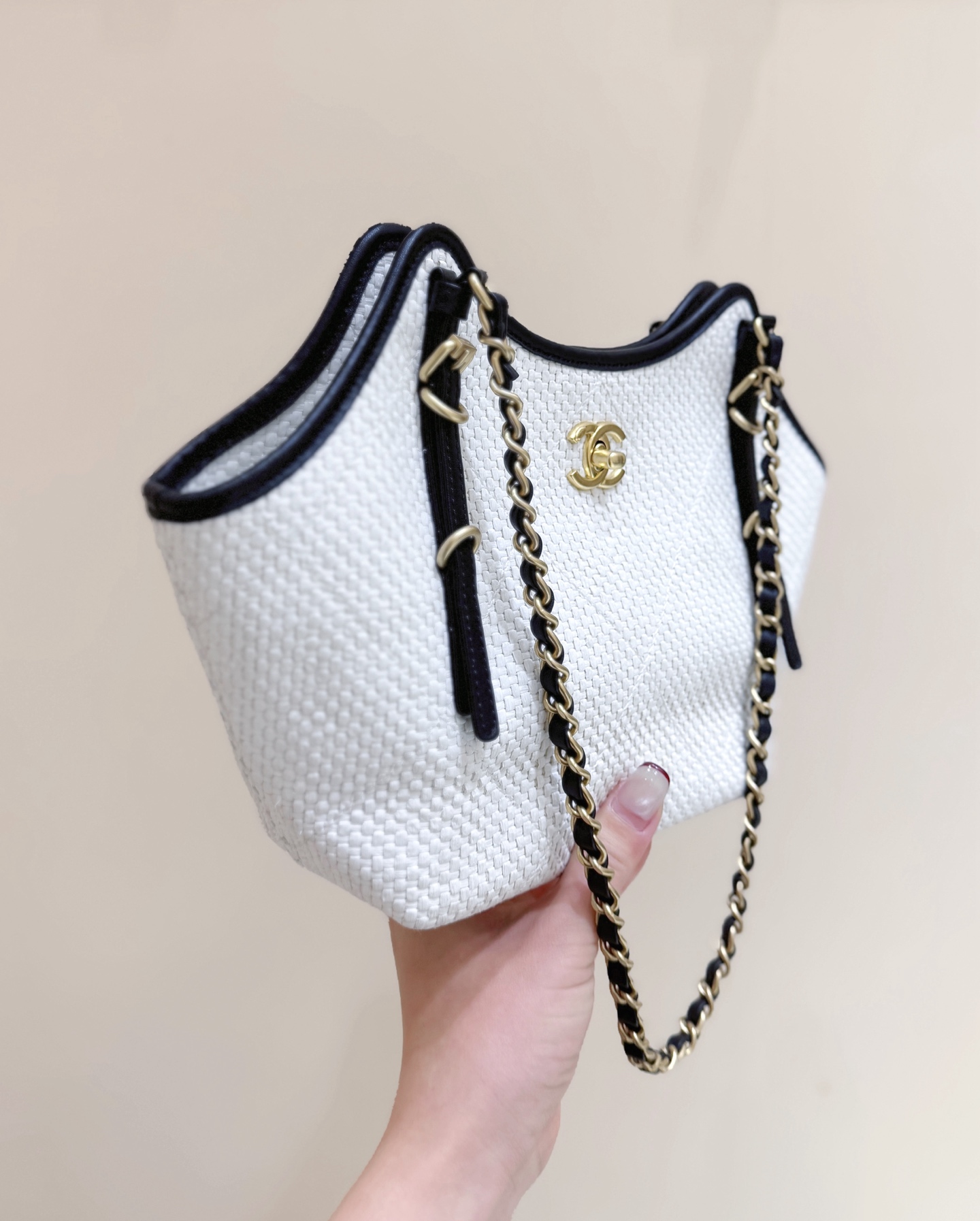 Chanel Maxi shopping bag, Braided raffia, calfskin & gold-tone