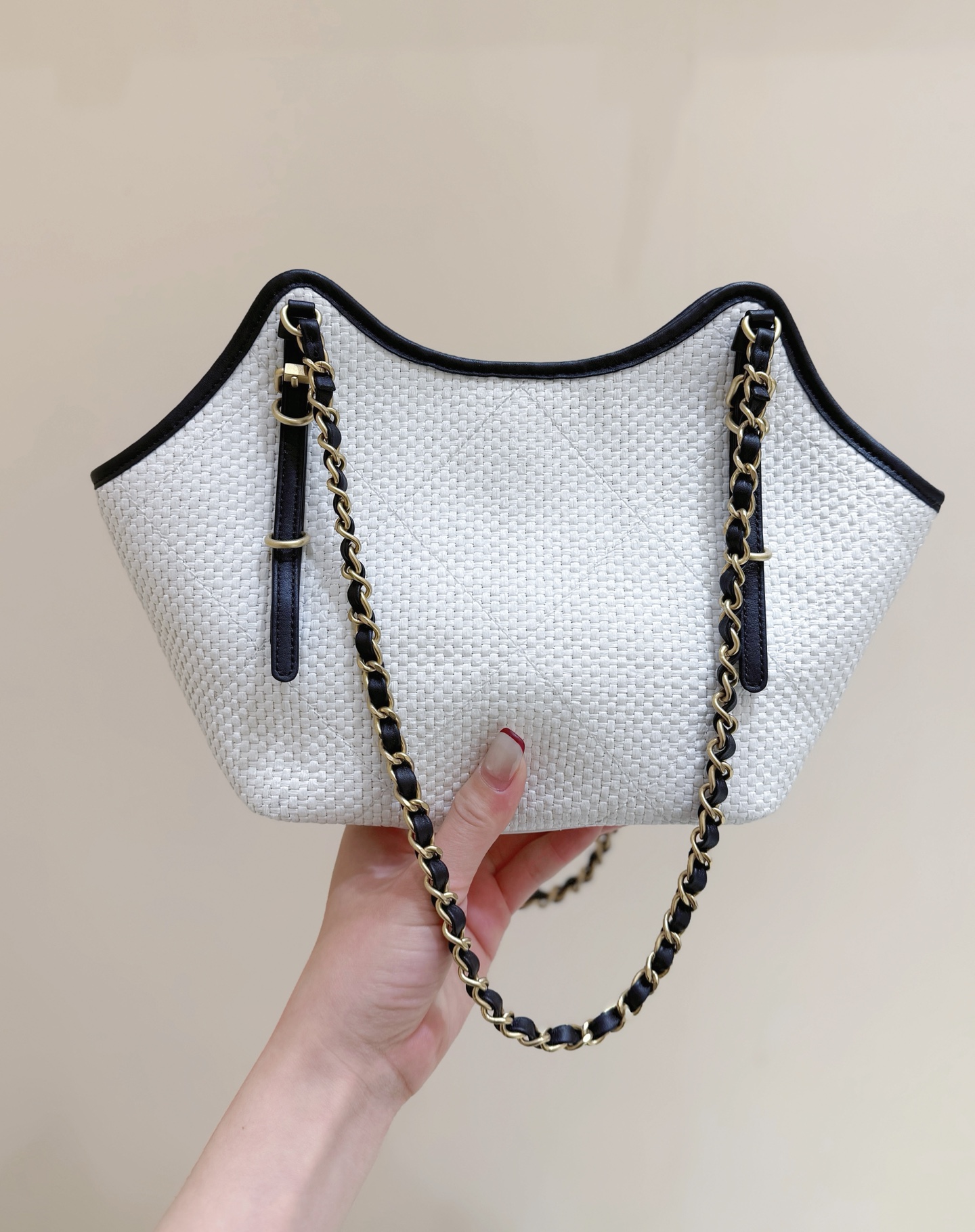 Chanel Maxi shopping bag, Braided raffia, calfskin & gold-tone