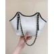 Chanel Maxi shopping bag, Braided raffia, calfskin & gold-tone