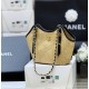 Chanel Maxi shopping bag, Braided raffia, calfskin & gold-tone Apricot
