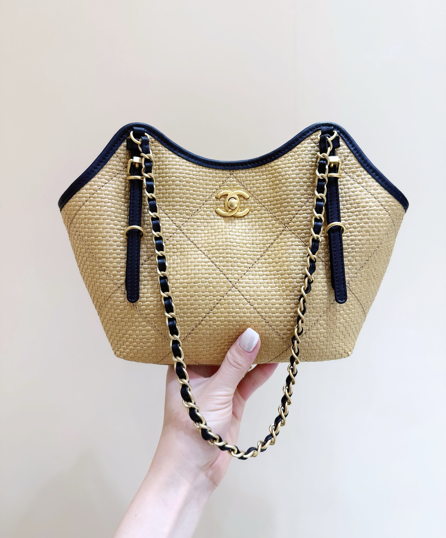 Chanel Maxi shopping bag, Braided raffia, calfskin & gold-tone Apricot