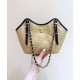 Chanel Maxi shopping bag, Braided raffia, calfskin & gold-tone Apricot