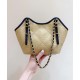 Chanel Maxi shopping bag, Braided raffia, calfskin & gold-tone Apricot