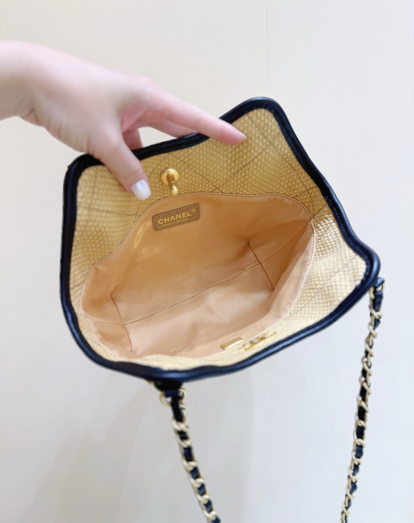 Chanel Maxi shopping bag, Braided raffia, calfskin & gold-tone Apricot