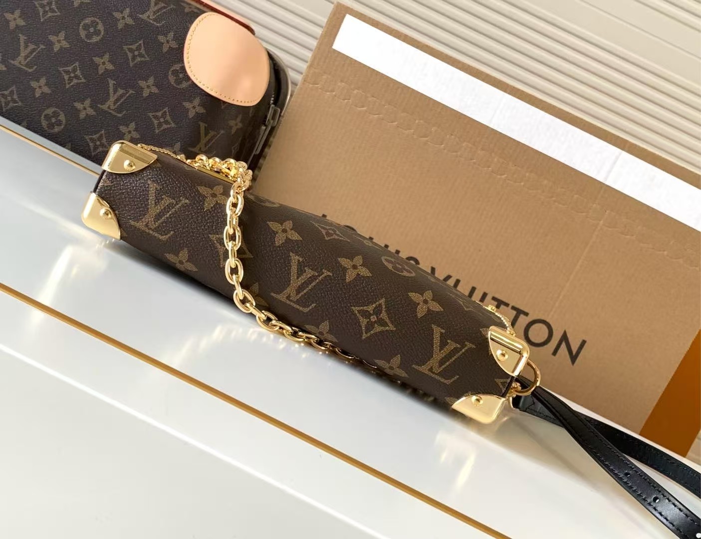 LOUIS VUITTON MonogramSlim Soft Trunk 