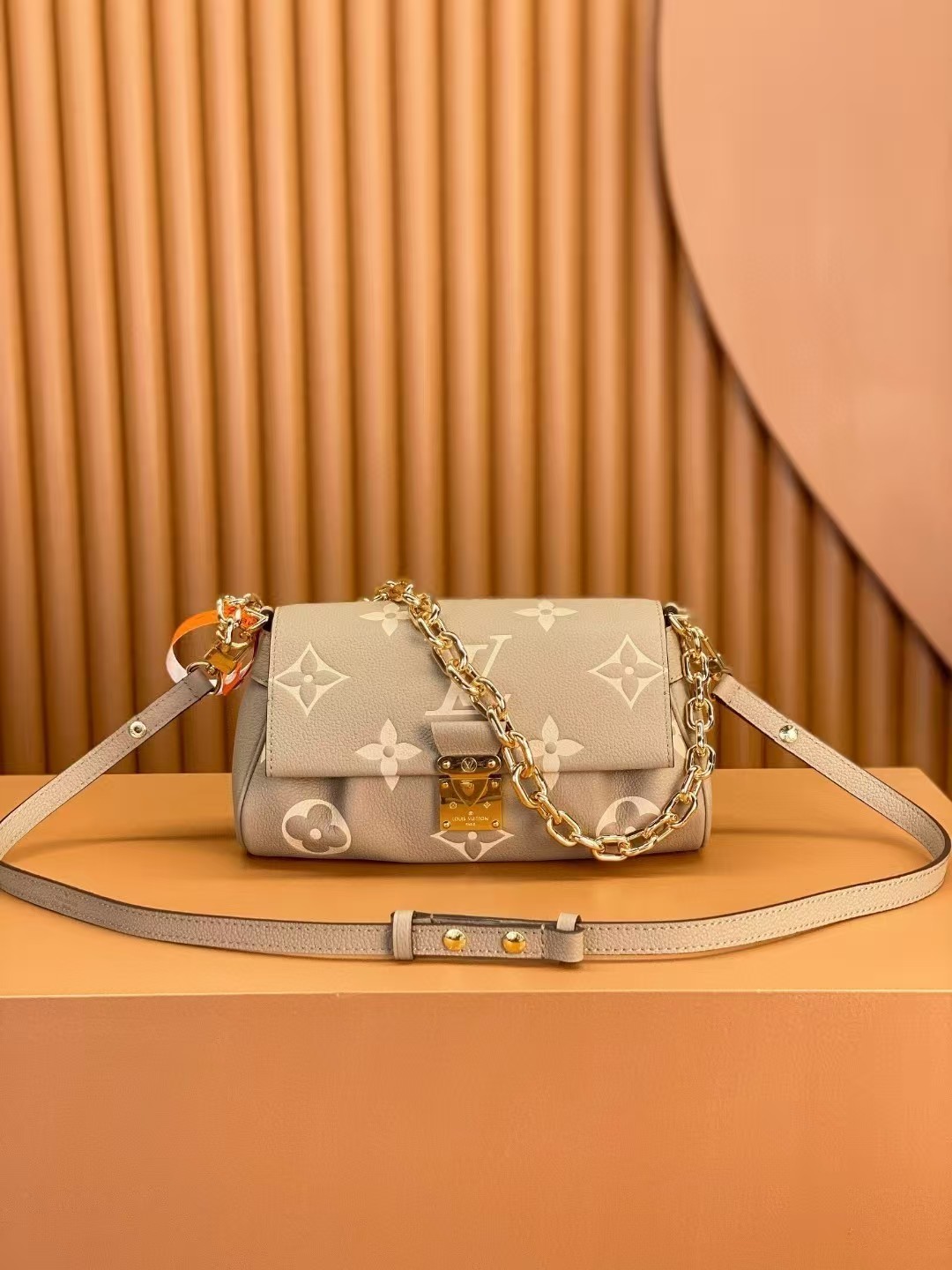 Louis Vuitton Favorite Bicolor Monogram Empreinte Leather Cream Color