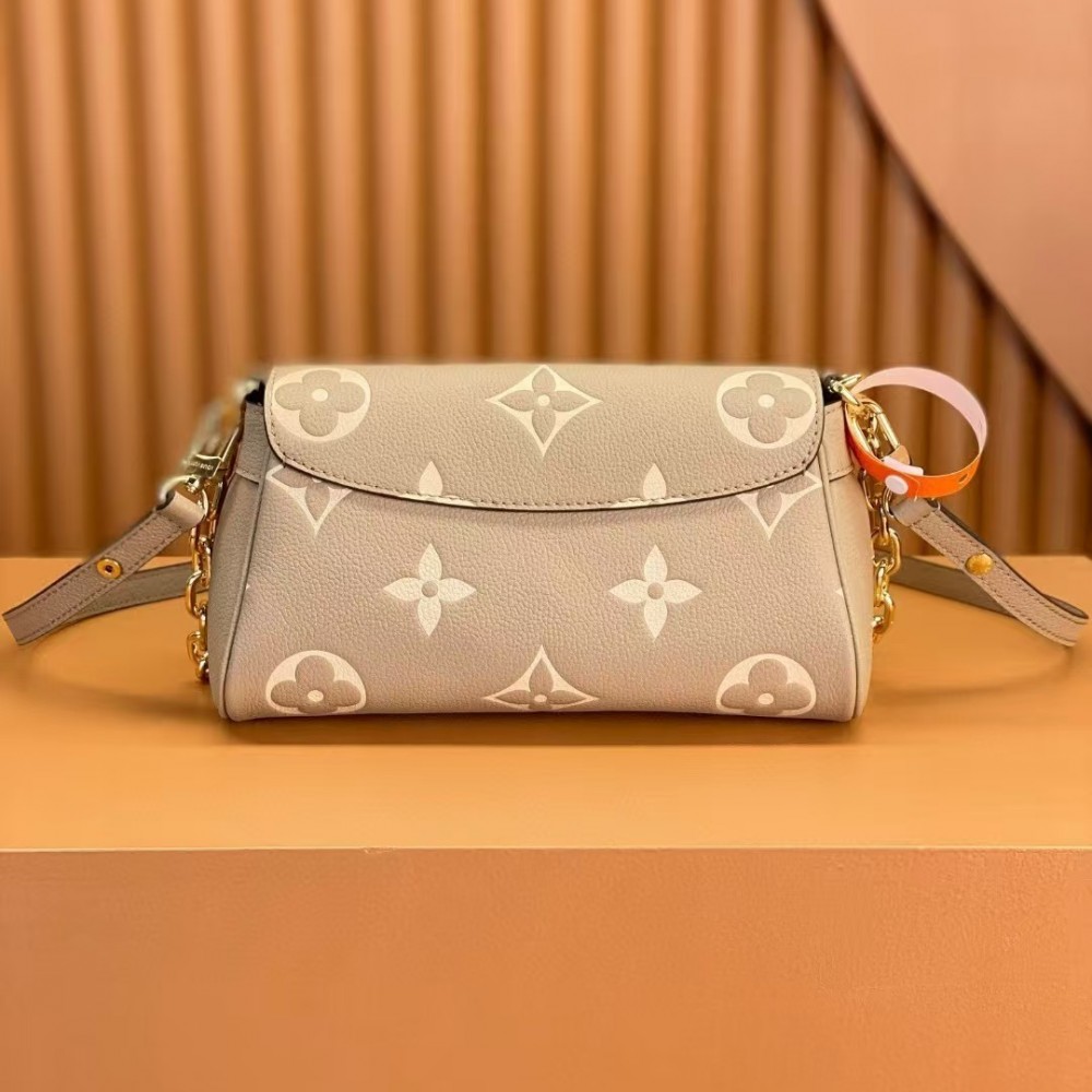 Louis Vuitton Favorite Bicolor Monogram Empreinte Leather Cream Color