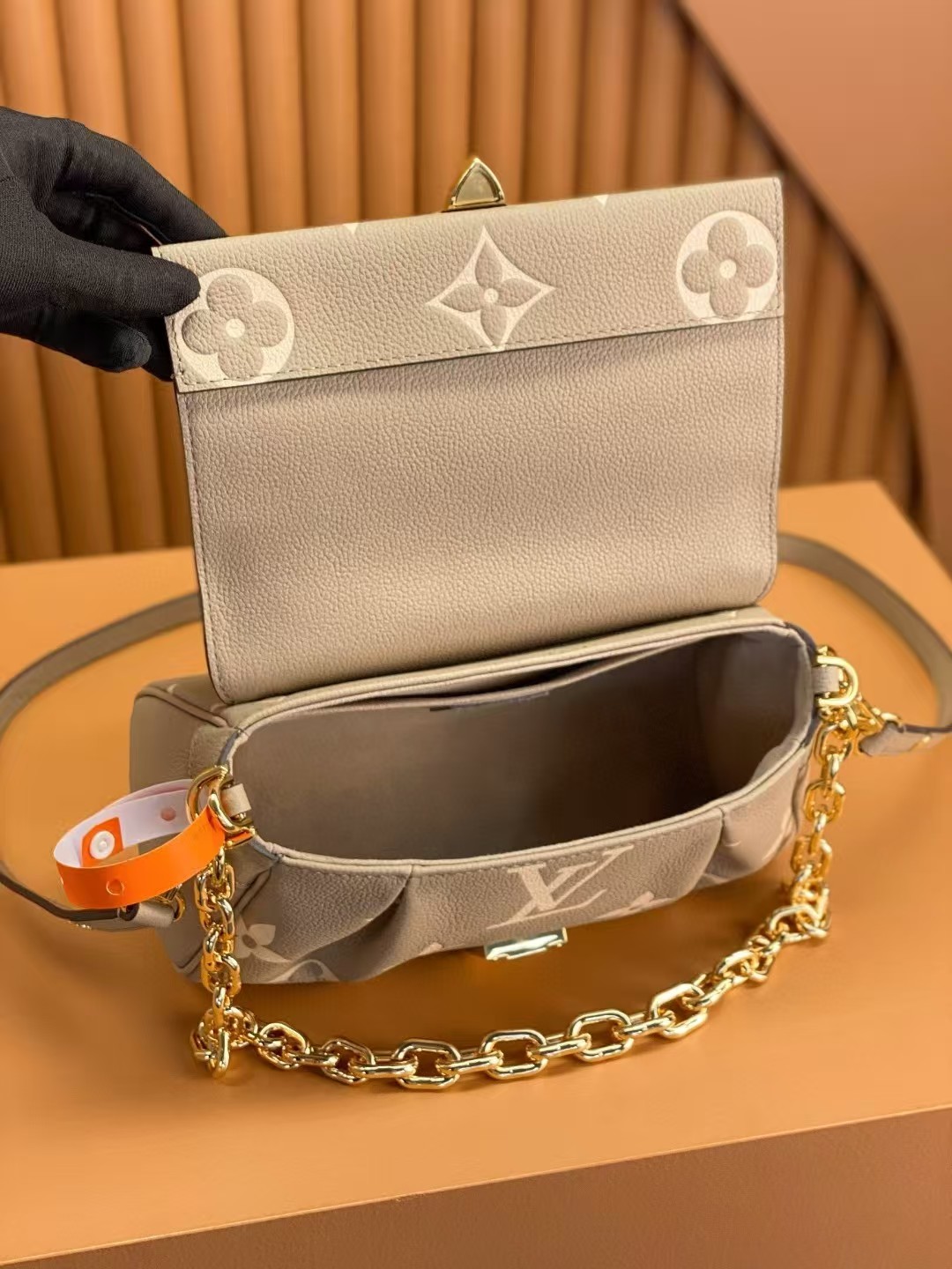 Louis Vuitton Favorite Bicolor Monogram Empreinte Leather Cream Color