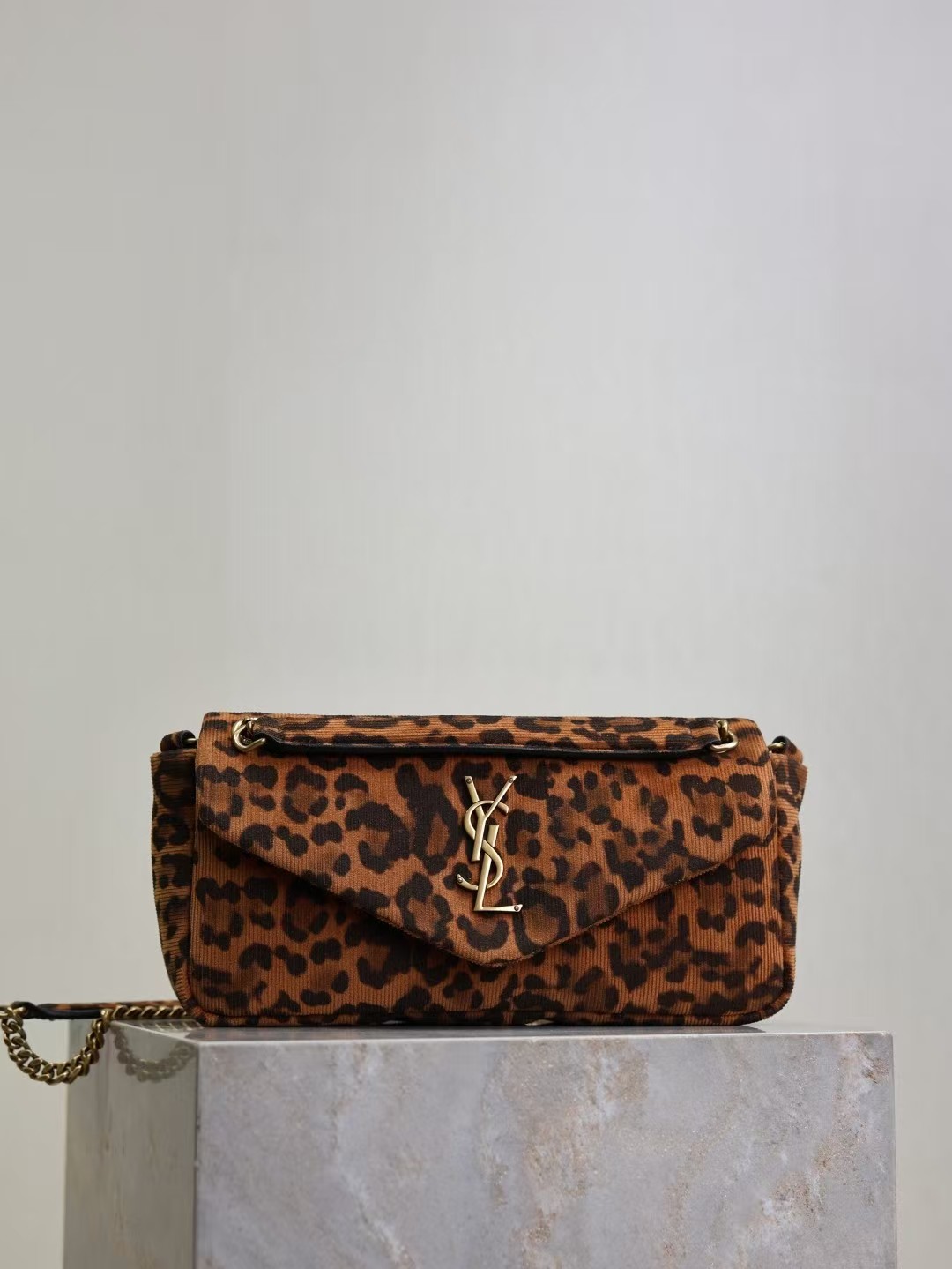 YSL CASSANDRE ENVELOPE CHAIN WALLET IN CANVAS 