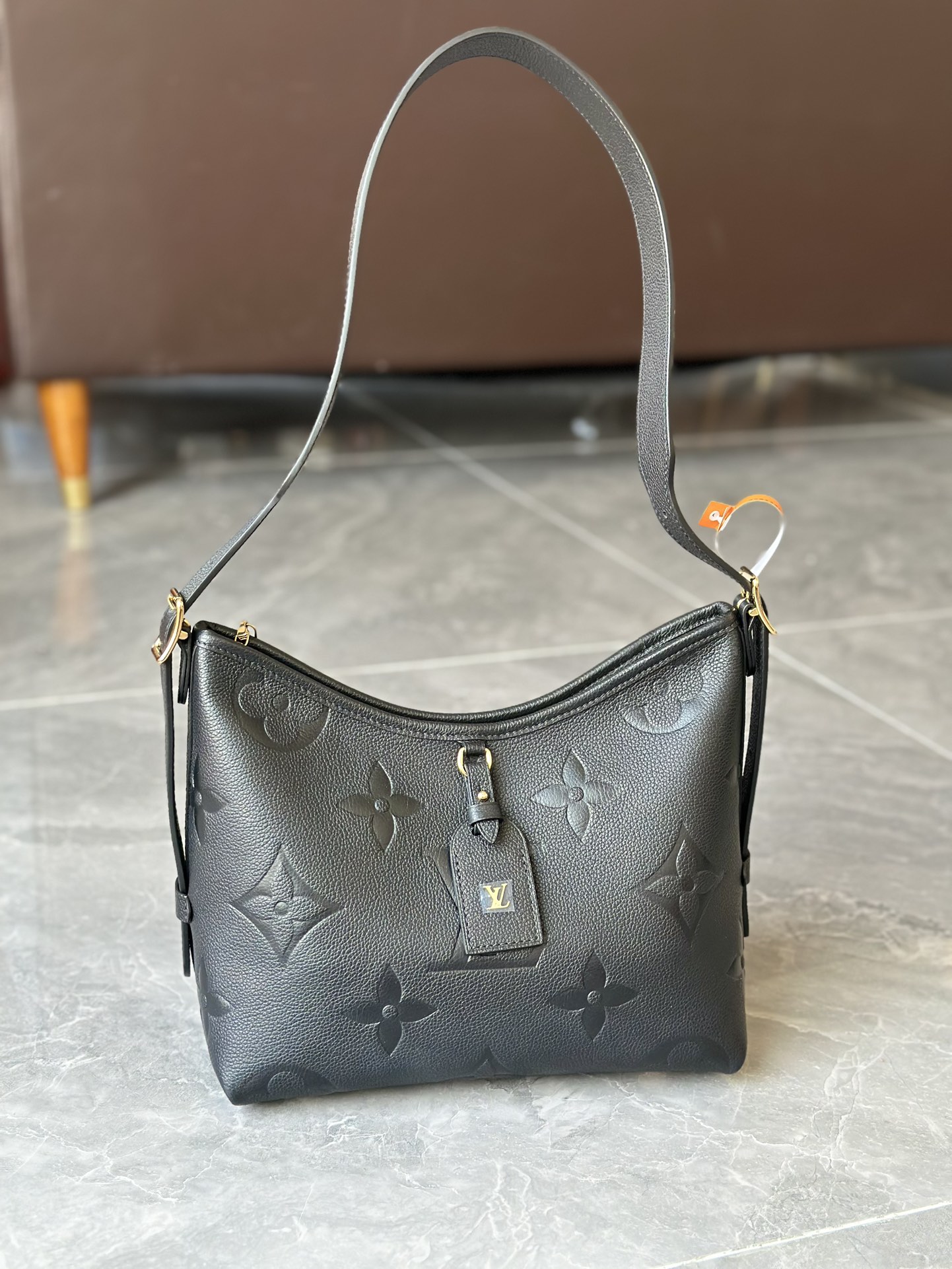 LOUIS VUITTON CarryAll Monogram Empreinte Leather-Women LOUIS VUITTON CarryAll Monogram Empreinte Leather-Women